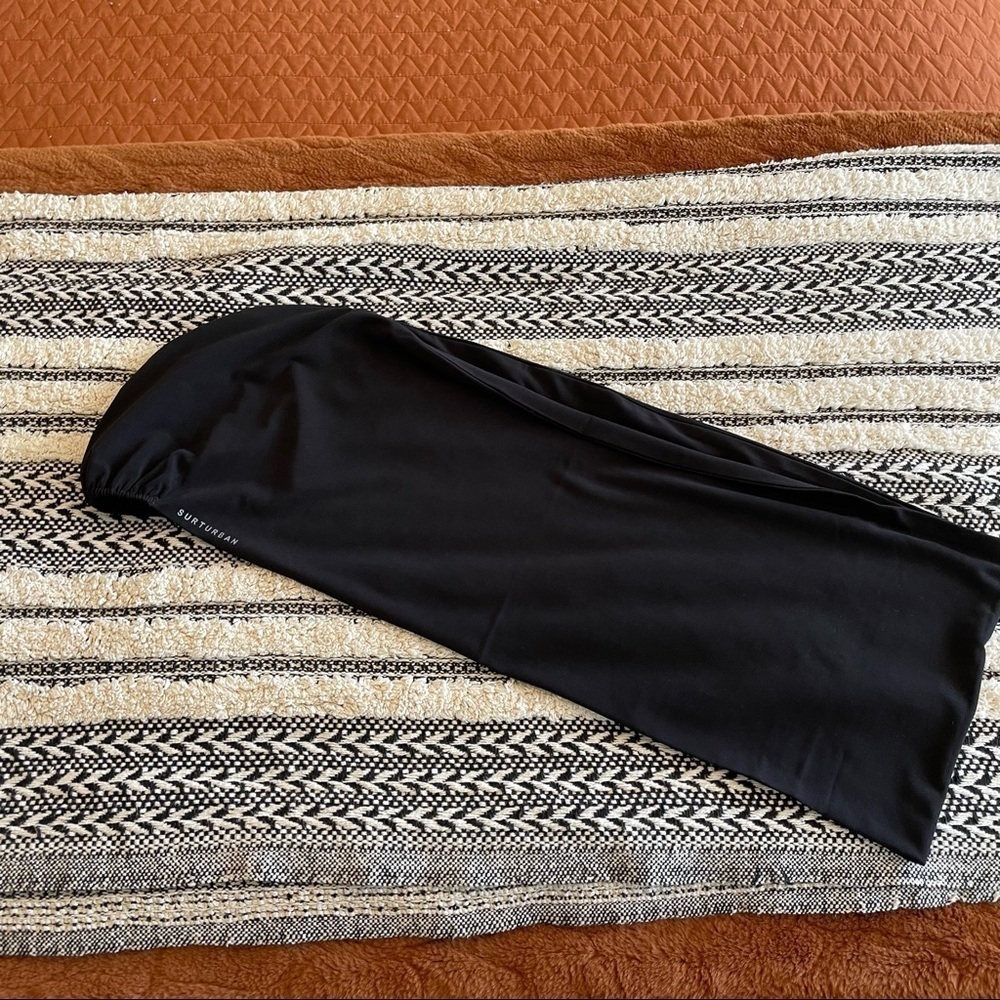 New in package surturban black slinky material one size